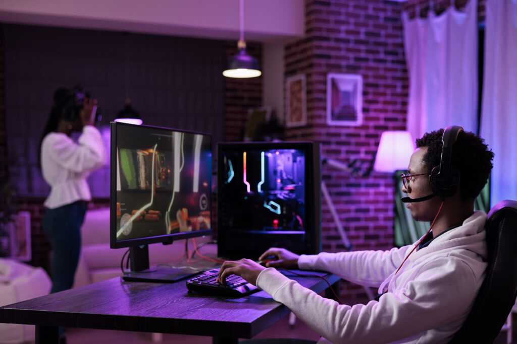 african-american-player-streaming-online-video-games-play-pc-using-computer-have-fun-with-esport-gaming-tournament-male-gamer-playing-action-game-championship-internet