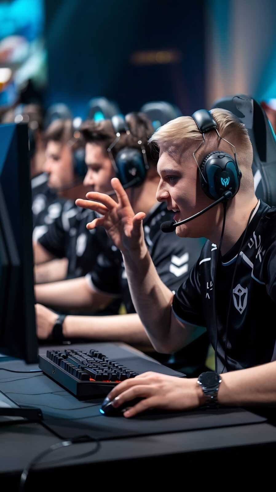 man-using-pc-gaming-setup-relaxing-playing-multiplayer-online-action-game-talking-team-headse